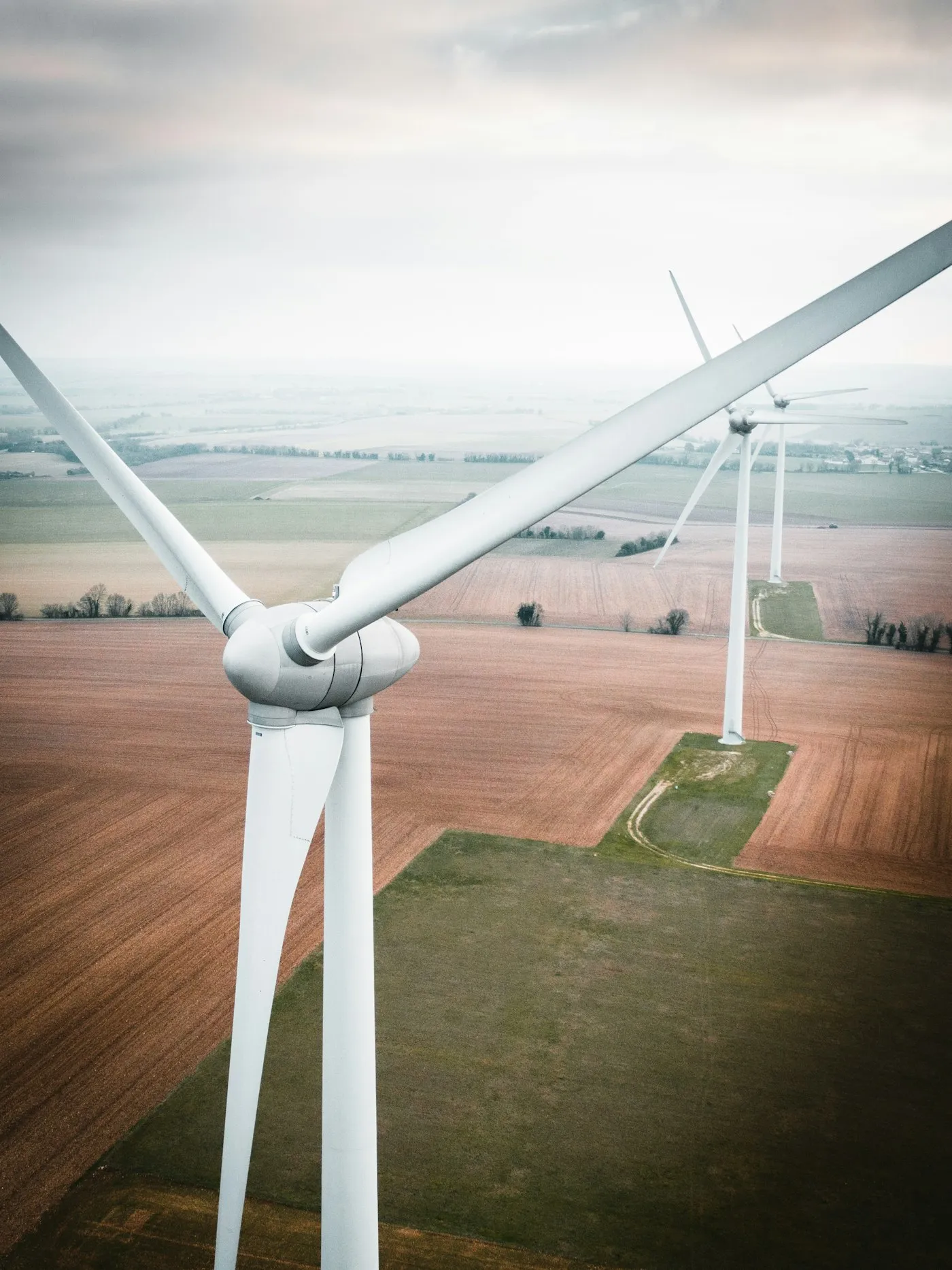 Three white wind turbines